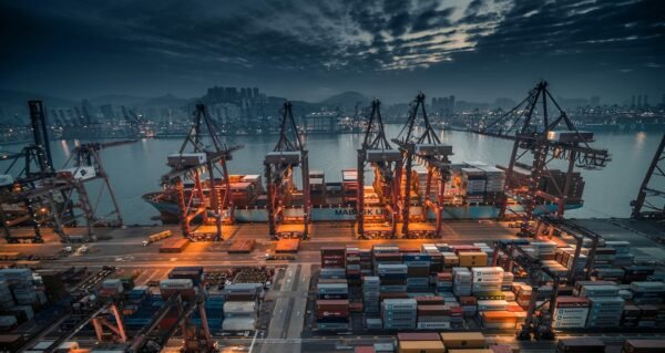 Container ship being loaded at a port
