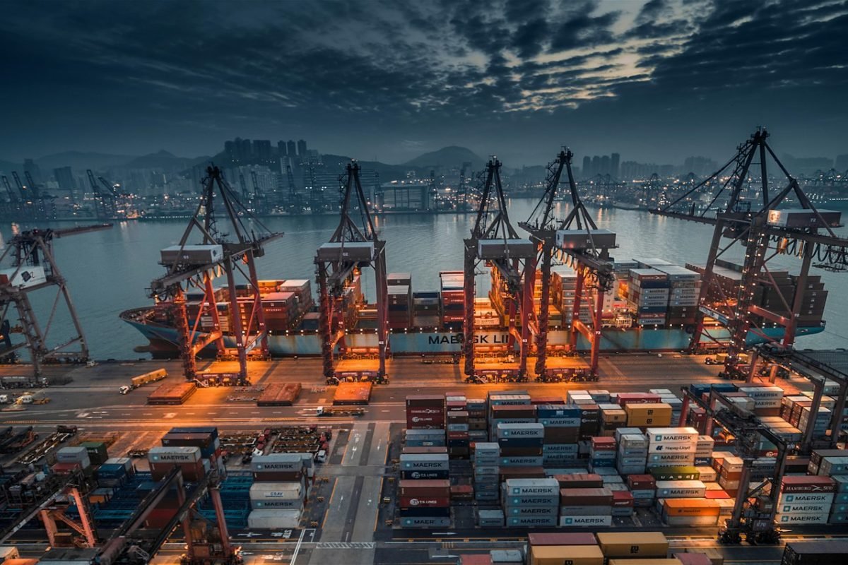 Container ship being loaded at a port